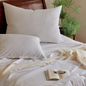 Blair White on bed with Florence Sheets and Duvet Sacha Ivory and Sylvan Ivory